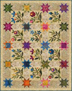 a colorful quilt with stars and flowers on it