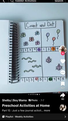 an open notebook with drawings on it