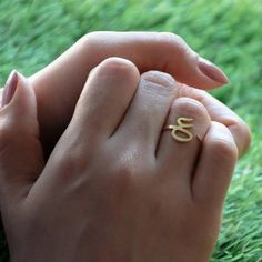 Adjustable Arabic Letter Ring - Brass with Gold or Silver Plating For Men and Women. 100% brand new and high quality. Ayn Letter (ع) Equivalent (A, I, O). * Adjustable in size, you can adjust the length according to your finger size. * Perfect gift for parents, girlfriends, boyfriends, wives, husbands, sisters, cousins, friends and lovers. * Occasions: Anniversary, engagement, gift, party, wedding, birthday, school. * Material: High-Grade Yellow Brass * Finish: Gold or Silver Plated The Ring is perfect for anyone with a name that starts with A, I, O or Ayn pronunciation, for example: Ayshe, Aysha, Abda, Atka, Adla, Adela, Asela, Alya, Amra, Amera, Ayda, Aisha, Ablaa, Abla, Abir, Abeer, Atab, Atba, Atika, Adlaa, Adawiya, Athra, Othub, Arabi, Arab, Orub, Oroub, Aziza, Eshtar, Ashk, Isam, Ita College Physics, School Material, Arabic Jewelry, Gift For Parents, Letter Ring, Initial Jewelry, Parent Gifts, Brass Finish, Party Wedding