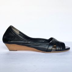 These Cole Haan Women's Black Leather Nikeair Peep Toe Wedges Are New Without Box And Never Worn. Size: 6.5 Description: - Peep Toe - Crisscross Detail - Stacked Wedge Heel - Slip-On Measurements: Sole Length: 9.25" Foot Bed Width: 3.1" Heel Height: 1.25" Wshl - 54 Casual Open Toe Heels With Leather Sole, Leather Sole Open Toe Sandals, Black Wedge Sandals With Leather Footbed For Spring, Black Wedge Sandals For Spring, Casual Sandals With Snug Fit And Round Toe, Black Leather Sole Sandals For Spring, Black Sandals With Leather Sole For Spring, Casual Open Toe Fitted Heels, Casual Fitted Open Toe Heels