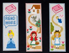 three cross stitch bookmarks with little princesses on them, one is red and the other is blue