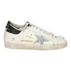 Elevate your sneaker game with the Golden Goose Women's White Sneaker, a perfect blend of luxury and laid-back style. Featuring a distressed white leather upper, these sneakers are designed for comfort and sophistication. The iconic star detail adds a signature touch, while the cushioned insole ensures all-day comfort. Whether paired with casual jeans or a chic dress, these sneakers make a stylish statement. Perfect for fashion enthusiasts looking to enhance their everyday outfits, these sneaker The Golden Goose, White Sneakers Women, Sneaker Games, Laid Back Style, Golden Goose, Chic Dress, Casual Jeans, White Sneaker, The Golden