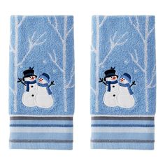 two blue towels with snowmen on them