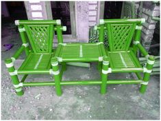 two green chairs sitting next to each other