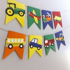 colorful paper banner with cars and trucks on it