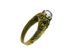 This Beautiful Estate Vintage styled 14 kt Yellow Gold Art Nouveau Goddess and Floral Engagement Ring/Band Features a very strong Art Nouveau Goddess and leaf design that goes 3/4 down on each side of the band. It also features a beautiful round Moonstone that's Multi-pronged set on the top. It's extremely sturdy, very unique in excellent condition and is sure to please the old soul in you or the special one you buy it for, it's pretty and would be a Perfect gift, Promise or even engagement Ring Art Nouveau Gold Ring With Gemstone, Gold Art Nouveau Jewelry With Intaglio, Art Nouveau Gold Ring Jewelry, Art Nouveau Yellow Gold Intaglio Jewelry, Victorian Moonstone Gold Jewelry, Victorian Gold Moonstone Jewelry, Spiritual Gold Moonstone Cabochon Ring, Victorian Gold Jewelry With Moonstone, Gold Moonstone Ring Collectible