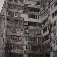 an old building with many windows and balconies