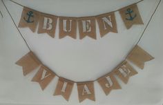 there is a bunting banner that says bluen and white with an anchor on it