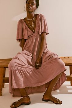 Forever free and flowy, this effortless maxi dress from our free-est collection is featured in a V-neck, tiered silhouette with flutter sleeves for added shape. * Soft, textured fabrication * Elastic empire waist * Effortless, pull-on style | La La Maxi Dress by free-est at Free People in Brown, Size: L Guest Attire, Wedding Attire Guest, Free People Clothing, Baby On The Way, Shop Maxi Dresses, Linen Women, Flutter Sleeves, Dress Codes, Empire Waist