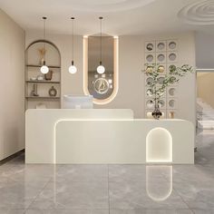 a white reception counter sitting inside of a lobby next to a plant and shelves with vases