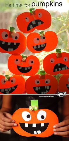 pumpkins with faces made out of construction paper and cutouts to make them look like they are smiling