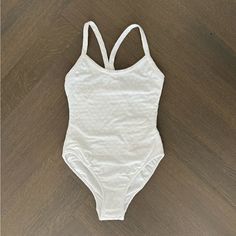 Chanel White One Piece Swimsuit Bathingsuit Cc Logo Print. Brand New With Tags, Swatch Of Fabrics And Dust Bag. Size 34. Stretch Jersey White Ref. P76778 V68953 00100 White Sleeveless One-piece Swimsuit, Elegant White One-piece Swimwear, Chanel Bathing Suit Bikinis, Chanel 2 Piece Swimsuit, Luxury White Swimming Bodysuit, Chanel Swimsuit, White One Piece, One Piece Swimsuit, Womens Swim