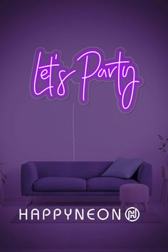 a purple neon sign with the words let's party on it in front of a couch