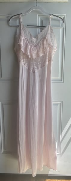 This vintage 1970's nightie gown is light pink and made of nylon and lace.  The bust measurement is 36 waist is 34 and length is 51 inches. It has spaghetti straps. It is in great shape. To see more of the variety of clothing we carry please visit my store at ChoiceRecycling.  We have a variety of recycled items with more to come soon. Thank you, Karmyn Melody Pajamas, Light Pink Gown, Bridesmaid Pjs, Pink Gown, Come Soon, Fairy Clothes, Fashion Articles, Pink Gowns, Recycled Items