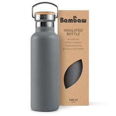 an insulated bottle next to a cardboard box