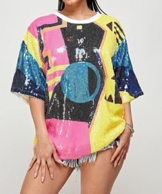 Multi color sequins top. Size: O/S Party Crew Neck Top With Contrast Sequin, Trendy Sequin Tops For Night Out, Contrast Sequin Crew Neck Top For Party, Graphic Print Top For Party Season, Graphic Print Tops For Party Season, Trendy Multicolor Party Tops, Trendy Party Top With Contrast Sequin, Trendy Multicolor Tops For Party, Glitter Print Tops For Spring Night Out