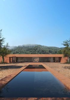 an empty swimming pool in the middle of a desert