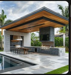 an outdoor kitchen and dining area next to a pool