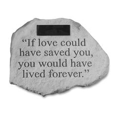 a stone with the words if love could have saved you, you would have lived forever