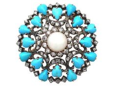 Handmade item  Recycling: No Gemstone: Rose cut diamonds, Turquoise & Pearl Brooch weight: 18.960 Grams  Diamond weight: 2.05 carats  Diamond colure: Light Tinted Brown  Diamond shape: Round  Turquoise weight: 8.15 carats  Turquoise: Lab created  Pearl weight: 1.36 carats  Brooch Length: 2.00 inch  Material: Silver  Sterling silver purity: 925 Brooch Finished: Antique & Gold Gemstone Brooch, Antique Turquoise, 12 December, Gold Brooch, Antique Brooches, Diamond Brooch, Gold Brooches, Pearl Brooch, Victorian Jewelry