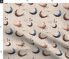 an image of a fabric with crescents and stars on it