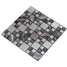 a mosaic tile design with different colors and shapes