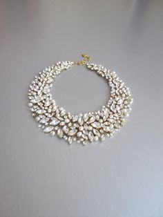 Swarovski crystal and pearl necklace in gold silver rose | Etsy White Pearl Chain Bridal Necklace, Glamorous White Pearl Embellished Necklace, Elegant Silver Pearl Bib Necklaces, Elegant Crystal Bib Necklaces For Weddings, Elegant Beaded Bib Necklace For Wedding, White Pearl Bib Necklace For Wedding, Elegant White Pearl Bib Necklace, White Pearl Wedding Bib Necklace, Gold Pearl Chain Necklace For Mother Of The Bride