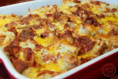 a casserole dish filled with meat and cheese