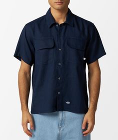 Dickies, a brand synonymous with durability and style, has been crafting quality workwear since 1922. With roots deeply planted in Texas, their vision is to merge functionality with timeless fashion. Embrace the warmth of Spring/Summer 2024 with the Dickies Linen Work Shirt. This sophisticated short sleeve shirt in a soothing shade of blue is perfect for both casual outings and professional settings. Expertly designed for comfort and versatility, it effortlessly combines style with practicality. Spring Summer 2024, Work Shirt, Work Shirts, Blue Hues, Primavera Estate, Summer 2024, Shades Of Blue, Short Sleeve Shirt, Stylish Outfits