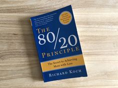 the 80 / 20 principee by richard koch on a wooden table