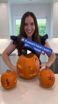 a woman holding three pumpkins in front of her face with the words parent hack i wish someone