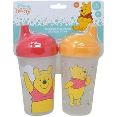 two winnie the pooh sippy cups in packaging