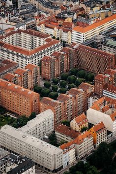 an aerial view of some buildings in the city