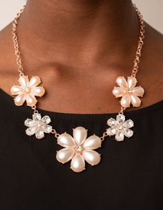 "Fiercely Flowering": Featuring glassy white rhinestone centers, bubbly pearl petaled shiny copper flowers gradually increase in size as they alternate with white rhinestone petaled flowers below the collar for a fierce floral fashion. Features an adjustable clasp closure. Sold as one individual necklace. Includes one pair of matching earrings. Copper Flowers, Bolo Necklace, Copper Pearl, Bling Necklace, Wooden Bracelet, Paparazzi Accessories, Floral Fashion, White Rhinestone, Copper Necklace