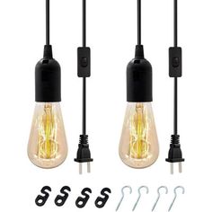 three light bulbs are plugged into the wall with hooks and screws on each side