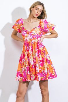 A printed woven mini dress featuring sweetheart neckline, twisted bodice with center cut out, short puff sleeve, full skirt and smocked back bodice Details: Self : 100% Cotton Size & Fit - Model is 5`8" And Wearing Size Small - Measurements Taken From Size Small - Approx. Length: 32" Timor Leste, Full Skirt, Guinea Bissau, Mozambique, Sweetheart Neckline, Uganda, Trinidad And Tobago, Bodice, Fitness Models