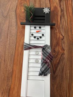 a snowman made out of an old door