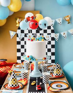 a birthday party with cars and balloons