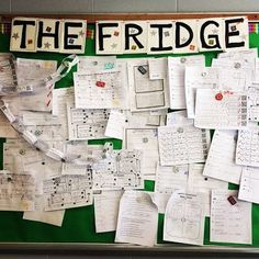 a bulletin board covered in notes and papers with the words the fridge written on it