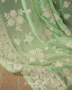 "Much Demand for these Lovely Chikankari on Pure Gorgette silk sarees ❤️❤️❤️ Rock your parties with this subtle Pastel Green Chikankari Pure Gorgette silk saree with all over Hand Chikankari work in white color threads. Theme: A Rose Garden Blouse is complemented in size 38\" and is expandable upto 44\" *Fall, Pico & Tassels : Done *Condition : New Saree With Stitched Blouse *Ready to Wear *Dry Clean Only Blouse: Pattern blouse with front buttons. Padded. Size 38\" expandable up to 42/44 or can Festive Pista Green Blouse Piece With Chikankari Embroidery, Pista Green Blouse Piece With Chikankari Embroidery, Designer Green Blouse With Chikankari Embroidery, Festive Green Chikankari Embroidery Blouse Piece, Festive Green Blouse With Chikankari Embroidery, Green Blouse With Chikankari Embroidery For Transitional Season, Pista Green Georgette Blouse Piece With Resham Embroidery, Pista Green Dola Silk Dupatta With Chikankari Embroidery, Pista Green Chikankari Embroidered Dupatta In Dola Silk