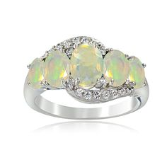 Accent your outfit and display your personal sense of style with the luxurious look of this ring. This sterling silver ring has a brilliant sparkle complemented by five Ethiopian opal gemstones surrounded by 14 round-cut white topaz stones. Product Details Metal Type sterling-silver Metal Stamp 925-sterling Weight 3.4GR Width 11.3MM Height 0MM Stone Details Gem Type opal Number of Stones 5 Stone Color white Stone Shape oval-shape Total Weight 1.1 Setting Type prongs Stone Creation Method natural Silver Halo Ring, Ethiopian Opal Ring, Blue Topaz Stone, Opal White, Ring Pendant Necklace, Topaz Stone, Toe Rings, Opal Gemstone, White Topaz