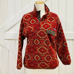 Patagonia Mens Xs Synchilla Fleece Jacket Snap-T Pullover Red Aztec Tribal In The Pattern Yanaba Molten Lava From Fall 2012. Has A Great Relaxed Fit- This Is Shown On A Women’s Size Large Dress Form. There Is Wear Along The Trim At The Bottom Of The Fleece The “Ribbon” Has Light Piling And Loose Threads. The Rest Of The Fleece Is In Very Good Condition. Beautiful Native Pattern. Gorgeous Colors. Condition Is "Pre-Owned". Shipped With Usps Priority Mail. Red Fleece Jacket For Outdoor Activities In Fall, Red Fleece Jacket For Fall Outdoor Activities, Red Winter Tops For Outdoor, Patagonia Long Sleeve Fleece Jacket For Fall, Patagonia Retro X Fleece, Red Patagonia Fleece, Patagonia Retro Pile Fleece, Patagonia Midweight Fleece-lined Jacket, Patagonia Sweater