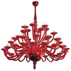 a red chandelier hanging from the ceiling with lots of lights on top of it