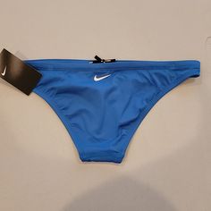 Nwt Nike Bikini Bottom Size Medium. Logo Is On The Back. Nike Swimwear For Poolside, Nike Beachwear Swimwear, Nike Beachwear Swimwear For Poolside, Nike Beachwear For Poolside, Nike Swimwear For Beach Season Sports, Nike Swimwear For Sports And Beach Season, Nike Swimwear For Sports During Beach Season, Nike Beachwear Swimwear For Summer, Blue Briefs For Water Polo