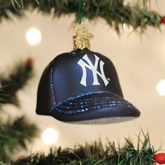 a baseball hat ornament hanging from a christmas tree