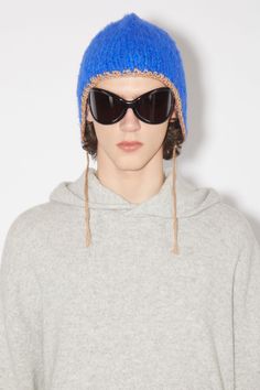 Acne Studios light grey melange hoodie is crafted from a wool and cashmere blend, cut to a relaxed fit. FN-MN-KNIT000339 Casual Wool Hoodie With Drawstring, Winter Wool Hoodie With Drawstring Hood, Casual Cashmere Hoodie For Winter, Hat With Ear Flaps, Cashmere Hoodie, Cotton Hat, Ear Hats, Blue Hat, Cashmere Wool