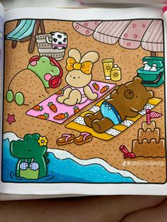 an open children's coloring book with teddy bears on the beach