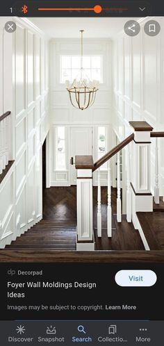 the stairs in this house are white and have wood treading on each one side