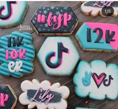 decorated cookies with the words tik tok be, lilly and music notes