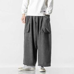 Wide Leg Pants For Winter Streetwear, Winter Wide Leg Bottoms With Hip Pockets, Wide Leg Bottoms With Hip Pockets For Winter, Winter Utility Wide Leg Bottoms, Cotton Wide-leg Cargo Pants For Winter, Winter Cotton Wide-leg Cargo Pants, Winter Wide-leg Cotton Cargo Pants, Winter Wide-leg Cotton Pants, Fall Streetwear Cargo Pants With Welt Pockets